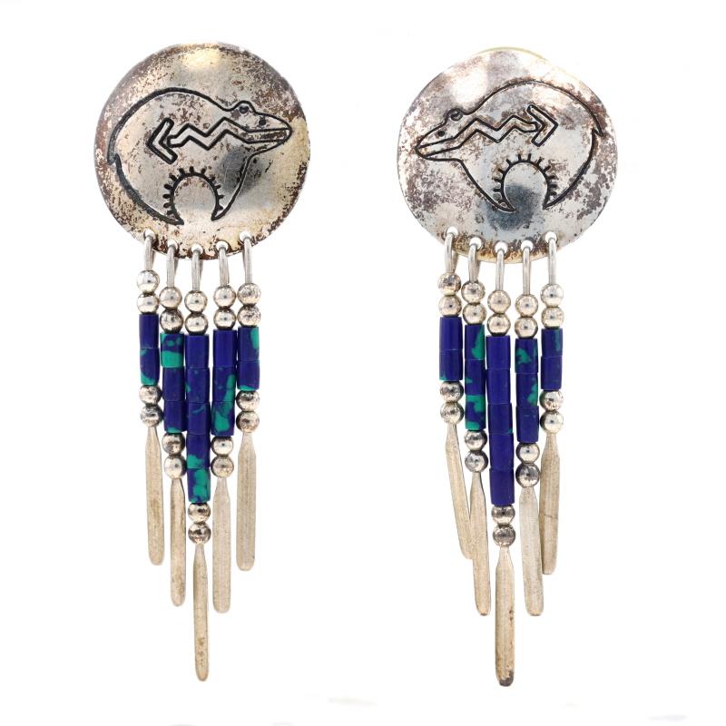 Design: Southwestern

Metal Content: 925 Sterling Silver

Stone Information

Natural Malachite Azurite
Cut: Beads
Color: Blue & Green

Style: Dangle 
Fastening Type: Butterfly Closures
Theme: Heartline Spirit Bear

Measurements

Tall: 2 5/32