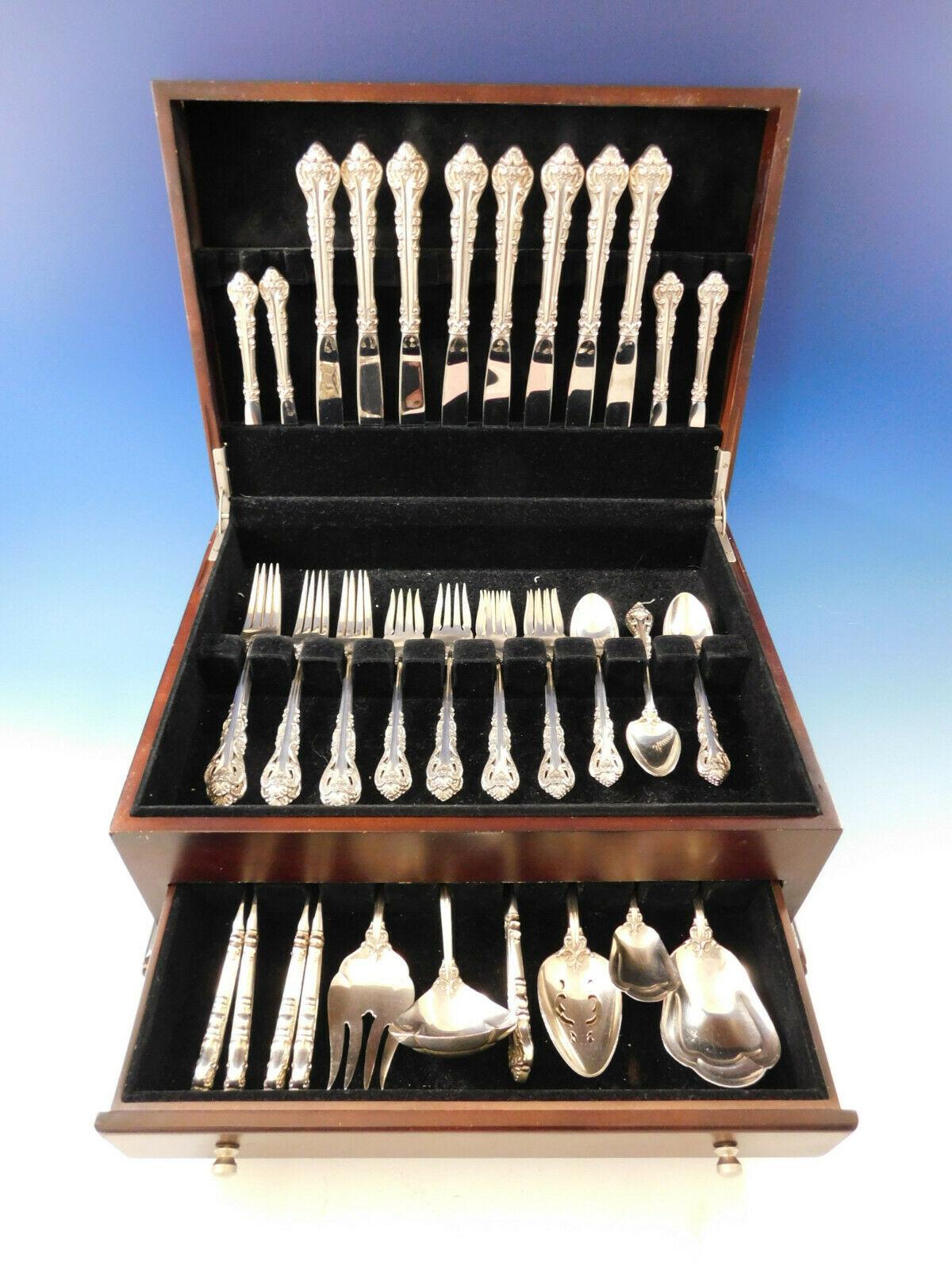 Silver Masterpiece by International (pierced handle) sterling silver flatware set, 47 pieces. This set includes:

8 knives, 9 1/4