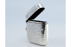 Silver matchstick with relief plant motifs