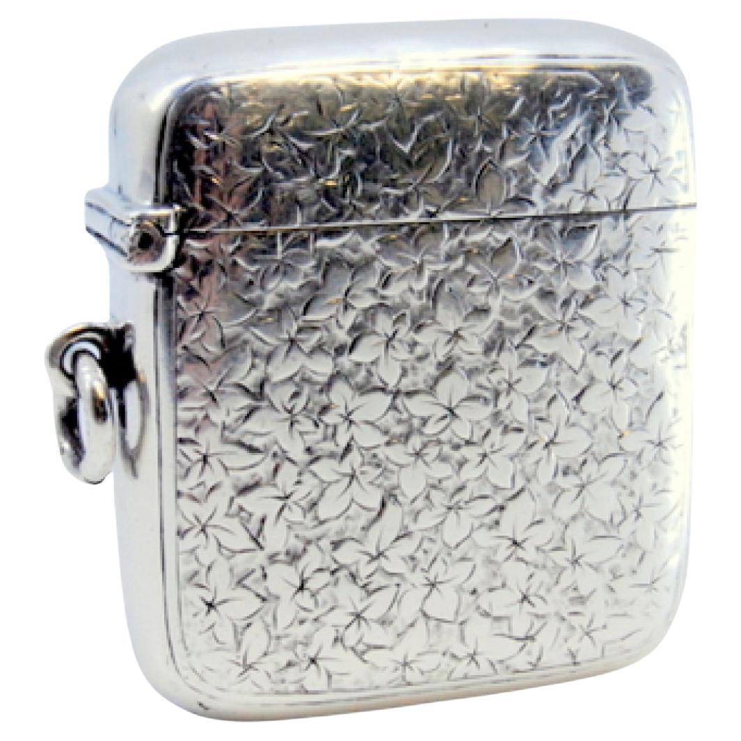 Silver matchstick with relief plant motifs For Sale