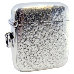 Silver matchstick with relief plant motifs