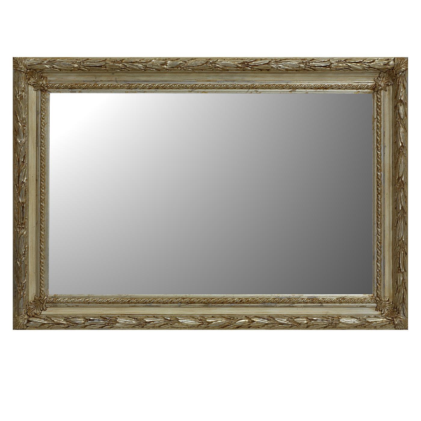 Extremely elegant in the choice of tones and materials, this gorgeous wall mirror is defined by an extraordinary wooden frame, finished with Mecca silver leaf highlighting its dramatic flair of Empire style inspiration. This piece will make a