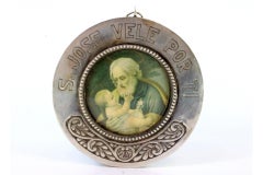 Silver medallion with pearl frieze and St. Joseph with Jesus