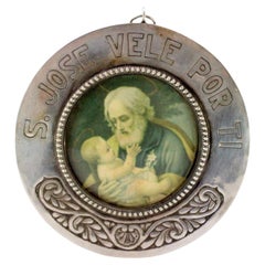 Silver medallion with pearl frieze and St. Joseph with Jesus