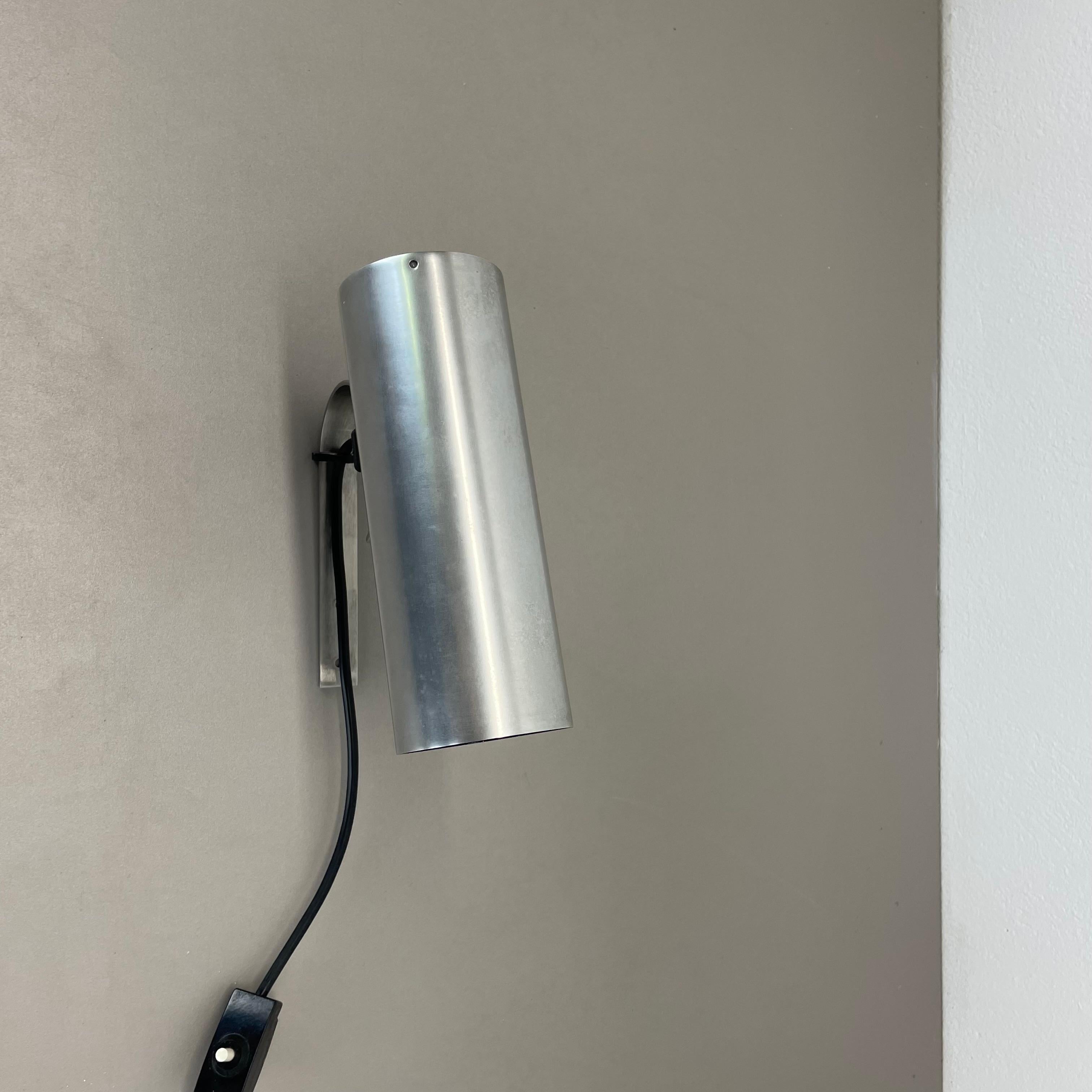 Mid-Century Modern silver metal adjustable SPACE AGE wall spot light by Erco Lights, Germany 1970s For Sale