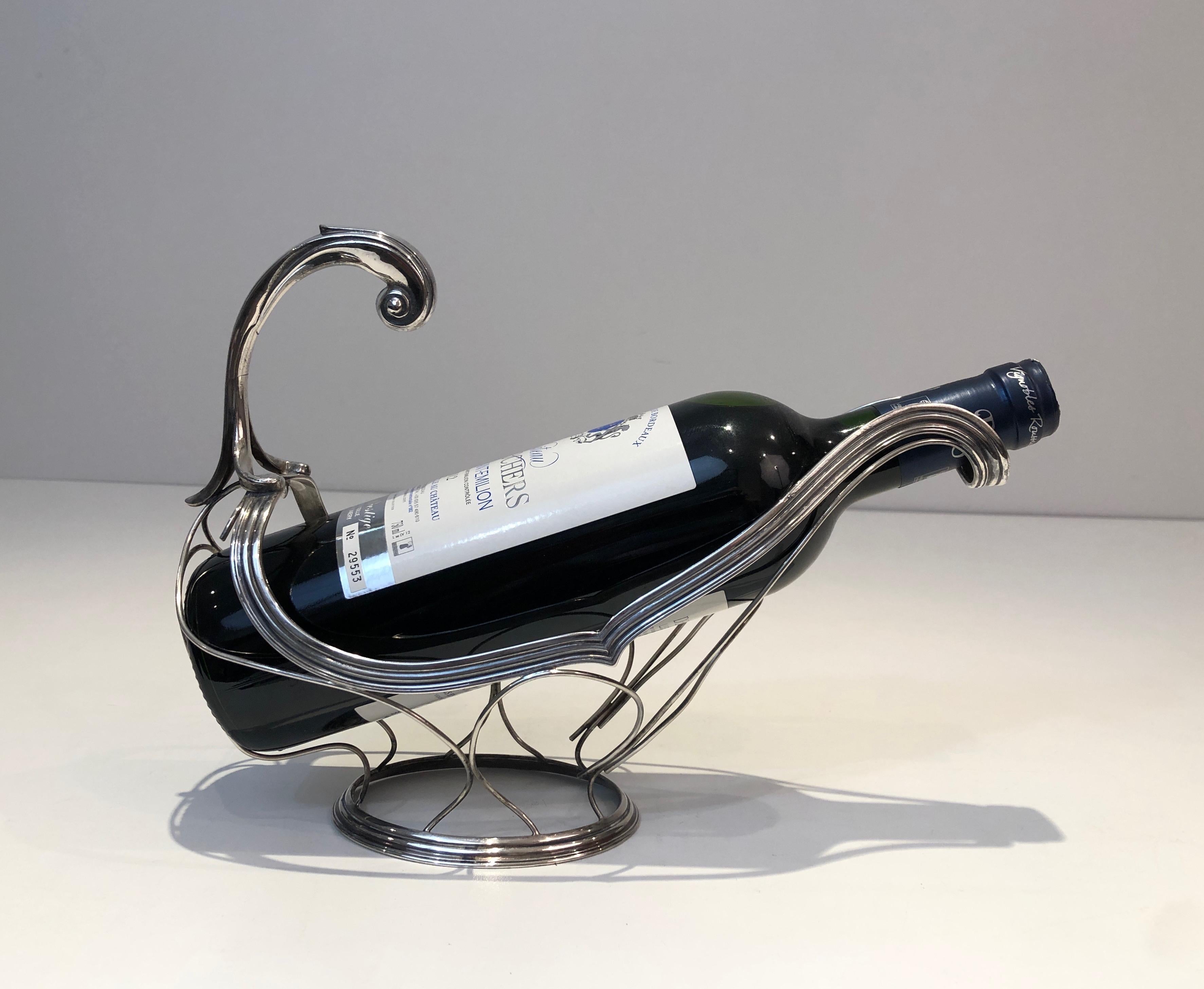 This elegant Art Deco bottle holder is made of silver plated. This is a French work, circa 1930.