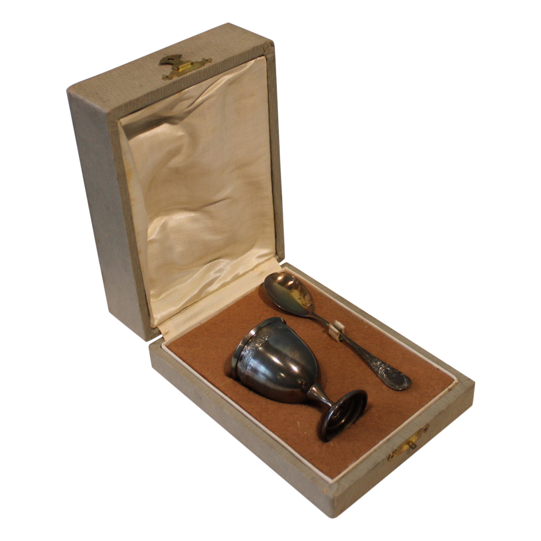 Silver metal egg cup and spoon