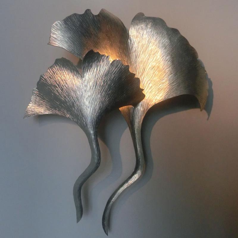Silver metal Gingko leaf wall light, elegant, presence and class.