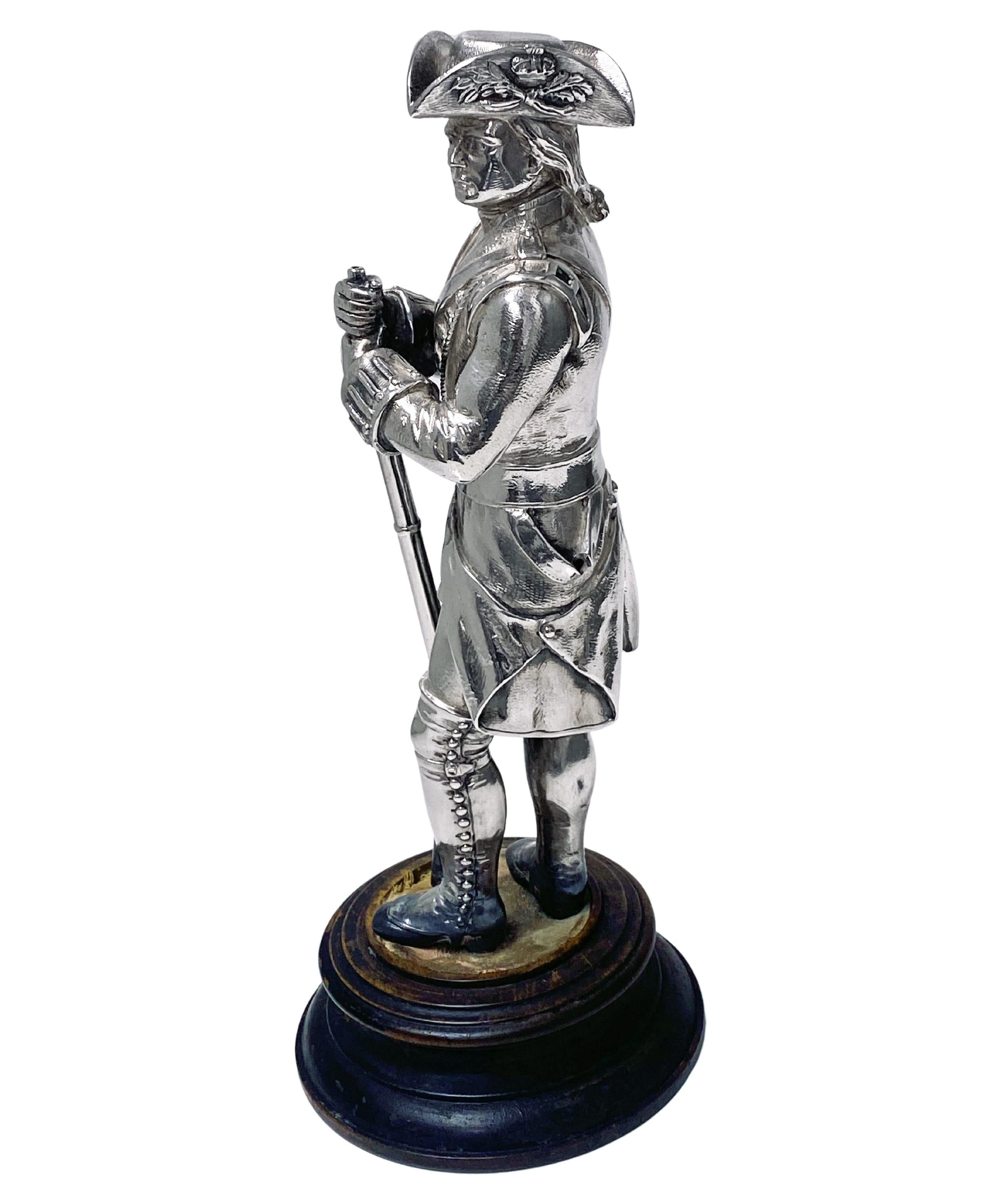 19th century sterling silver military figure, London 1882 George Angell.  Realistically modelled in the form of a soldier holding rifle, possibly Admiral Nelson. Holding a baker type rifle and uniform embellished with fine details of a soldier's