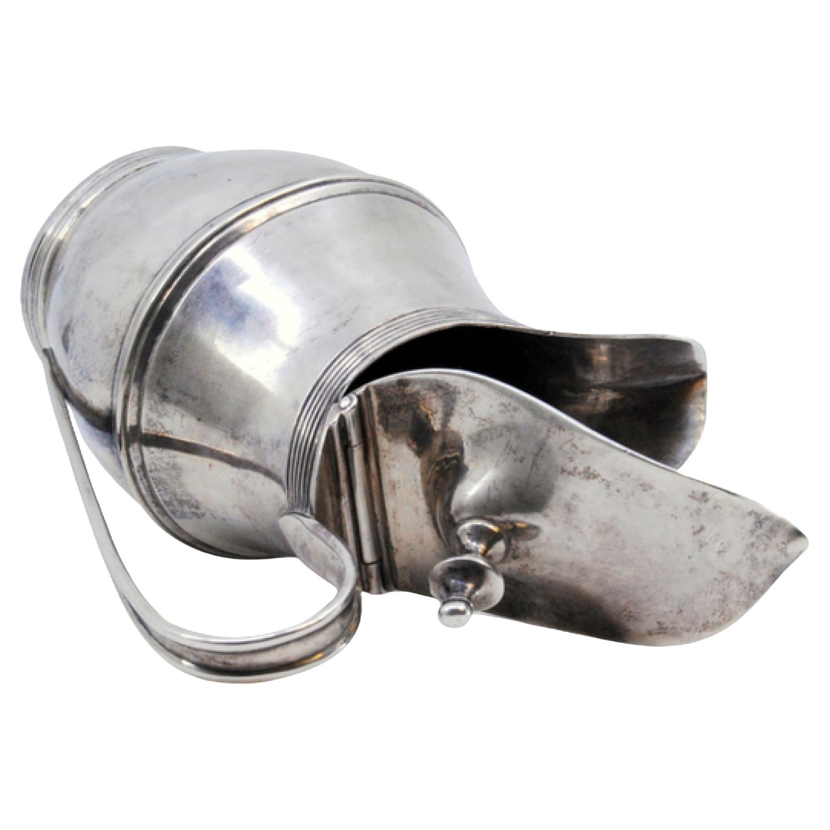 Silver milk jug with knobbed hinged lid, rim and base friezes, D. Maria style