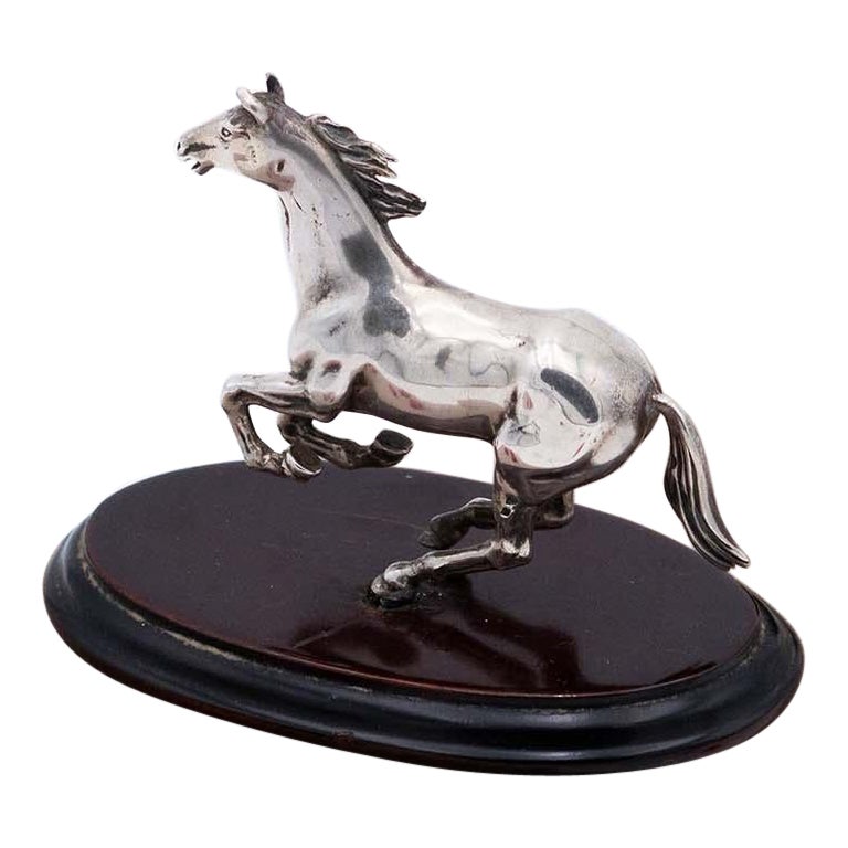 Silver miniature horse with wooden base