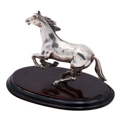 Silver miniature horse with wooden base