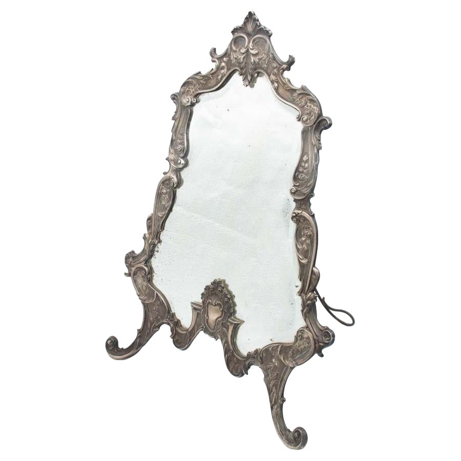 Silver mirror with high reliefs