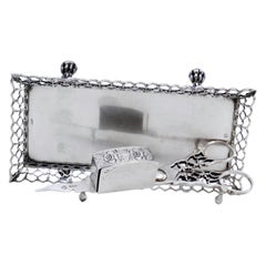 Silver morrões tray 
scissors w/ rack, reliefs 
4 claw feet