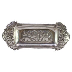 Silver morrões tray w/ floral & acanthus reliefs on 4 ball feet
