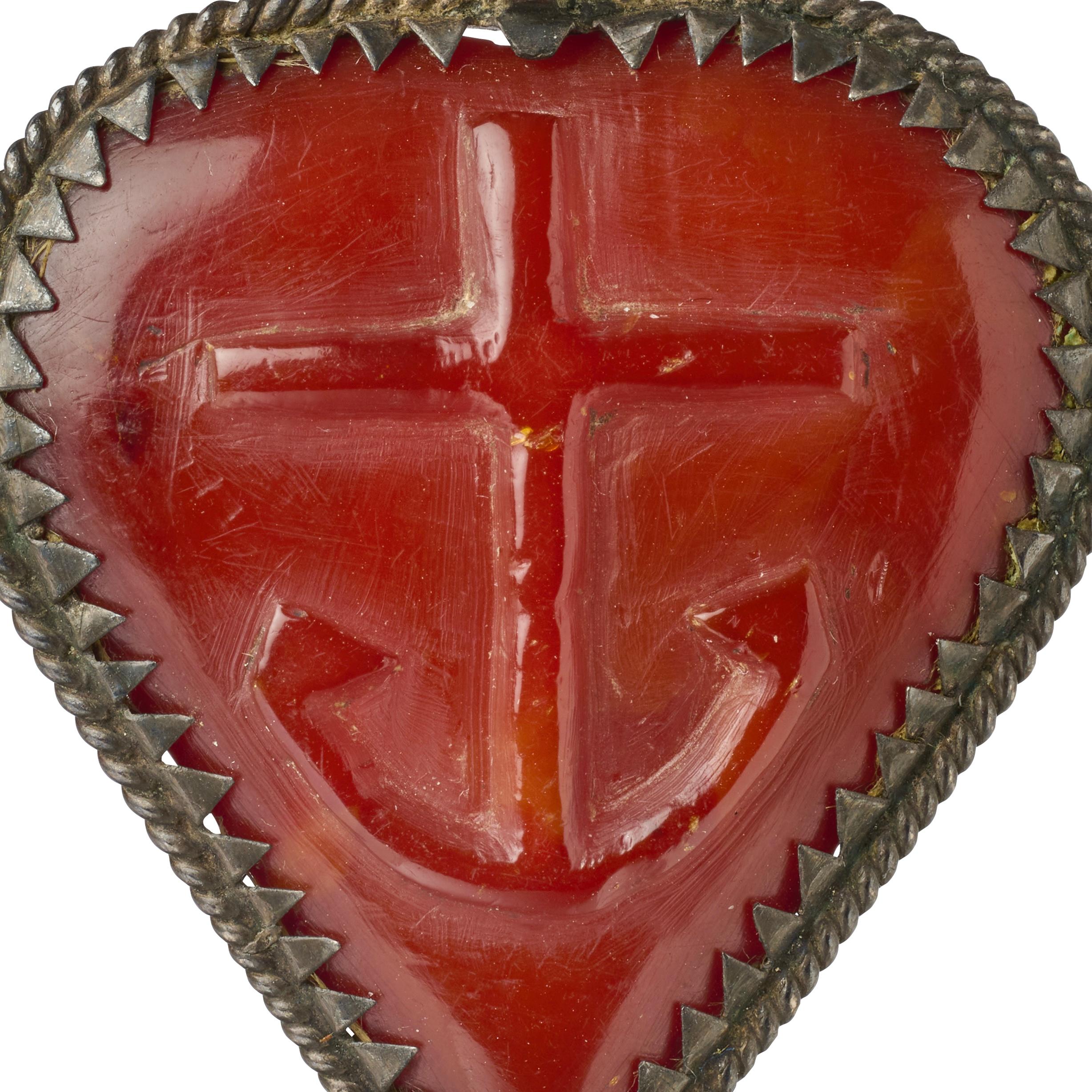 Silver-Mounted Amber Heart-Shaped Pendant Carved with Cross and Anchor

Germany, 17th century

Measurements

• 4.2 × 3.3 × 0.9 cm

• Weight: 5.4 grams


This devotional or talismanic pendant is carved from a single piece of translucent reddish-brown