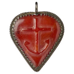 Silver-Mounted Amber Heart-Shaped Pendant. Germany, 17th century