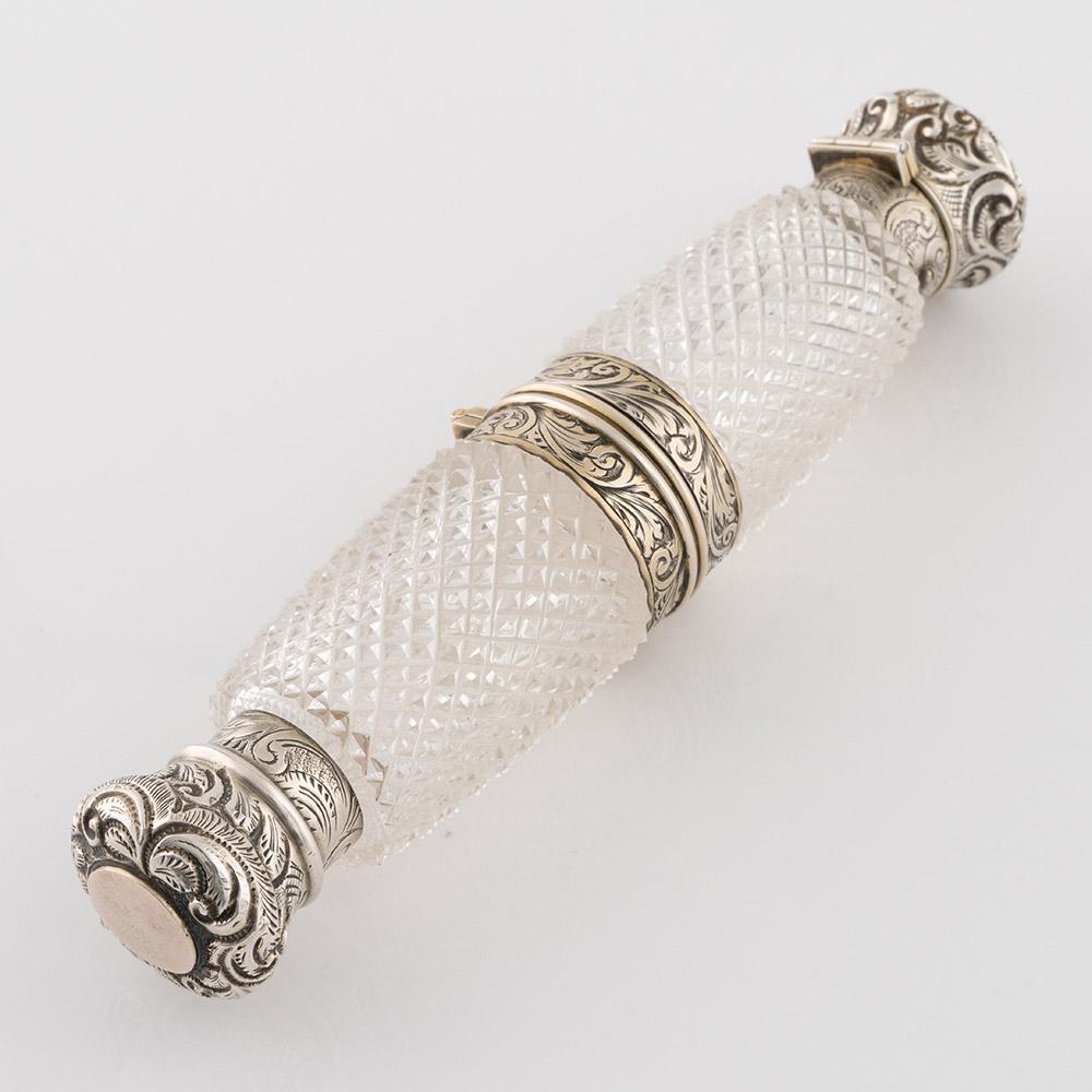 Heading : Silver Mounted Combined Double-Ended Scent Bottle Vinaigrette. Opera glass form
Date : C1875
Period : Victoria
Origin : We believe this to have been made by or for Leuchars and sons of London for retail in their Paris outlet, hence the