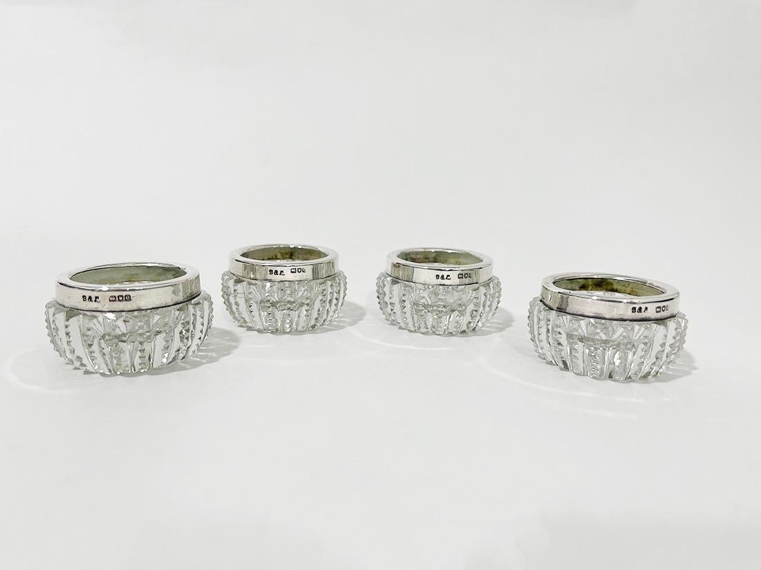 Silver Mounted Cut Crystal Salt cellars by Sanders & Aguilar, London, 1900

4 pcs cut crystal salt cellars with silver mounting. Dated with Year letter E for 1900 and English hall marked with the master sign for Sanders & Aguilar (1900- 1903) and