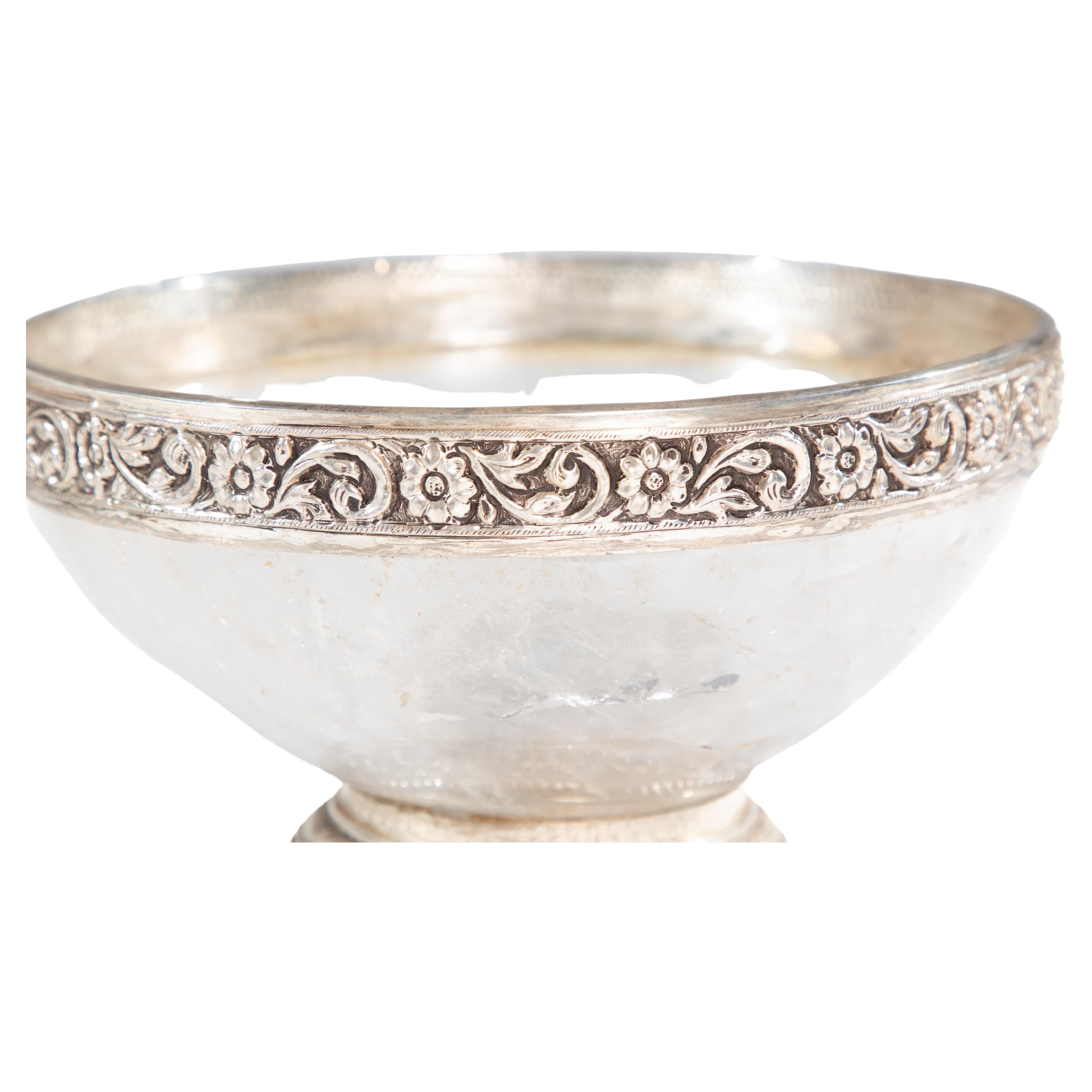 Beautiful rock crystal bowl mounted in silver with a floral / vine pattern.  