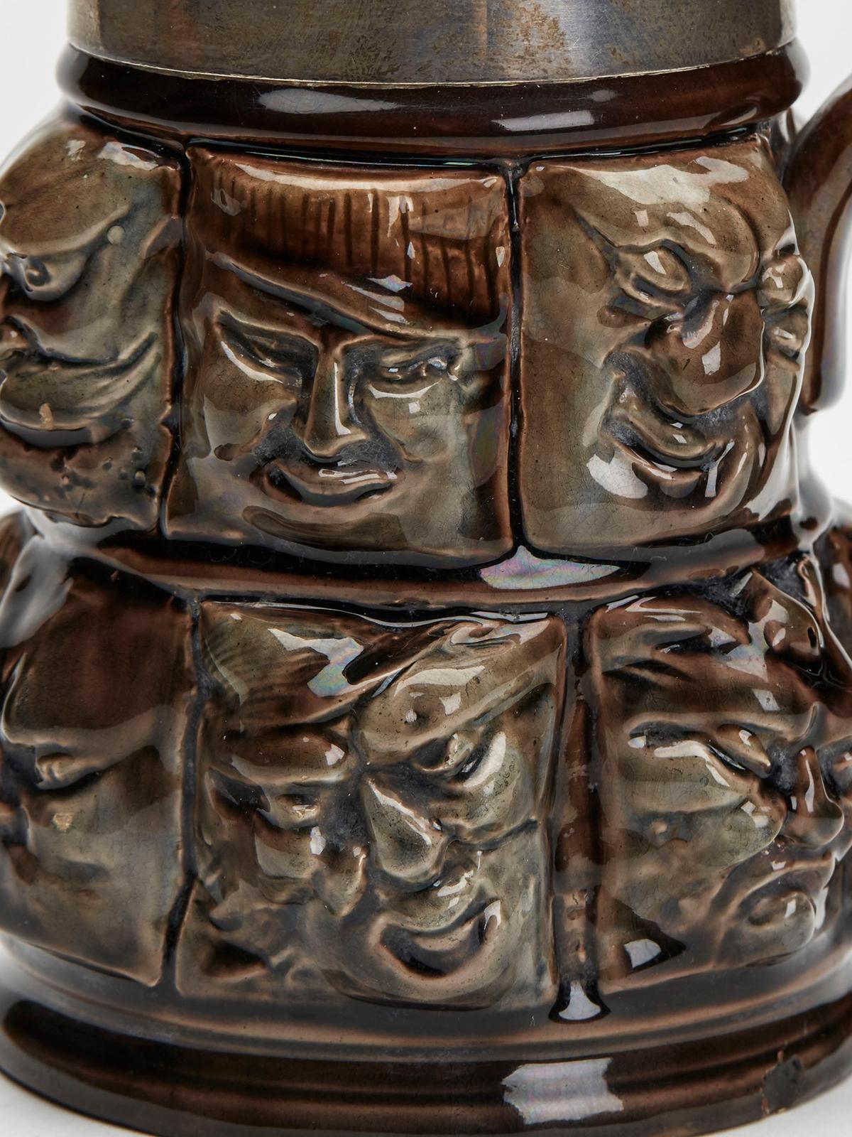 Silver Mounted Thirteen Grotesque Faces Molded Glazed Pottery Mug For Sale 6