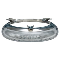 Cenicero para puros de cristal tallado con tres apoyos montado en plata, hacia 1935