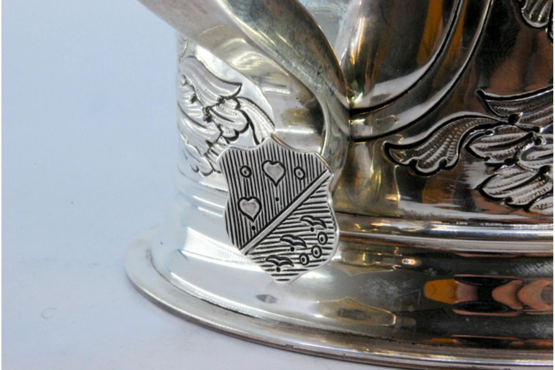 20th Century Silver mug with relief floral motifs surrounding monogram cards For Sale