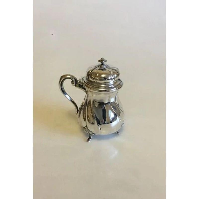 Silver Mustard Cup

Measures 10.5 cm / 4 9/64 in. Weighs 95.2 g / 3.36 oz.