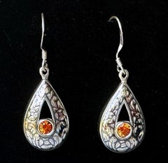 Silver Nielloware Earrings set with Orange Sapphires