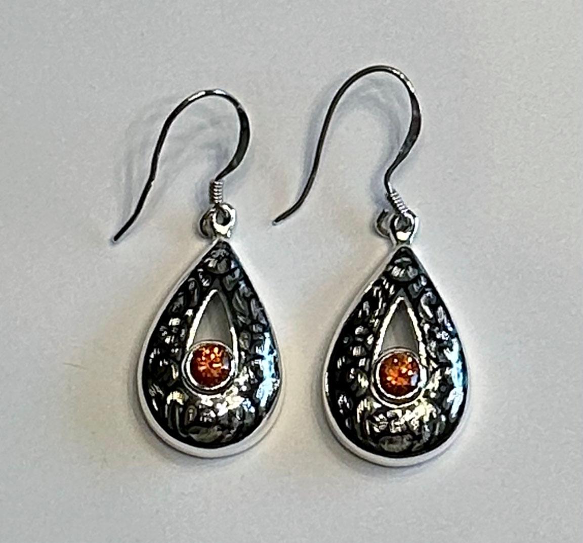 Round Cut Silver Nielloware Earrings set with Orange Sapphires For Sale