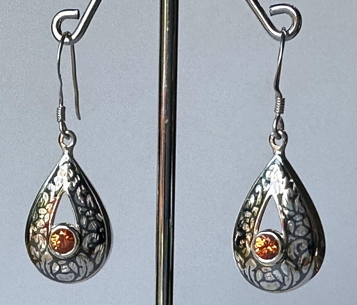 Women's Silver Nielloware Earrings set with Orange Sapphires For Sale