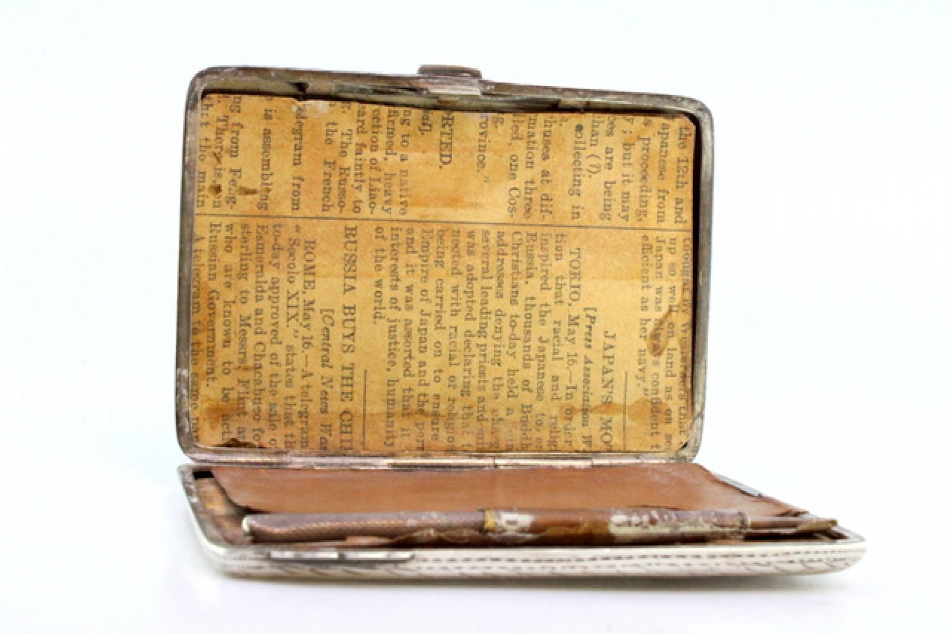 Description: Silver notepad with engraved floral motifs and mechanical pencil inside. Metal: Silver. Origin: English. Brand: Birmingham. Weight: 72.17 grams (Gross Weight). Dimensions: 9.2cmx6.5cm. Content: 925/1000. Assay Mark: Yes, 1819.