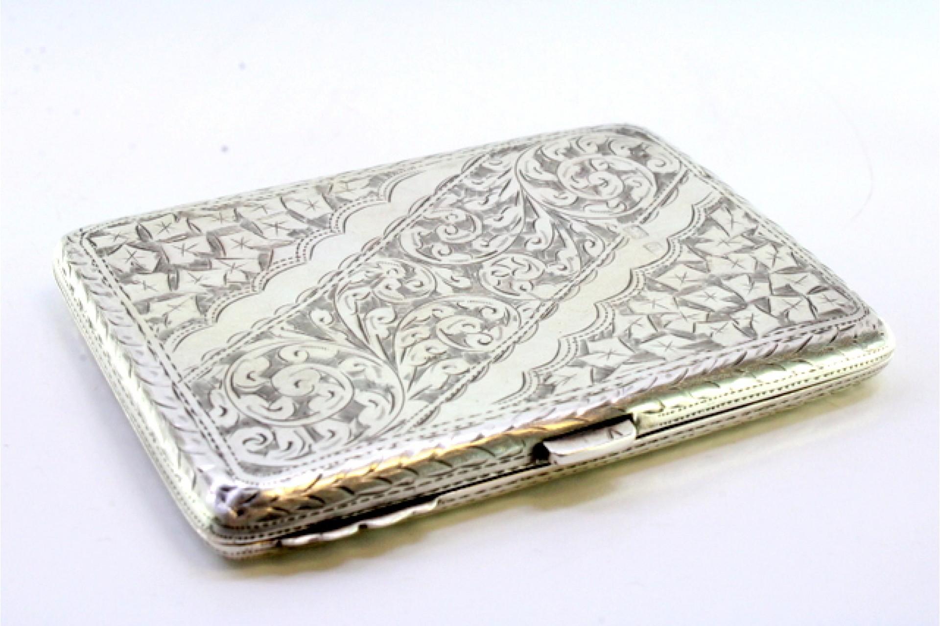 Silver notepad with floral reliefs, pen and leaves For Sale 1