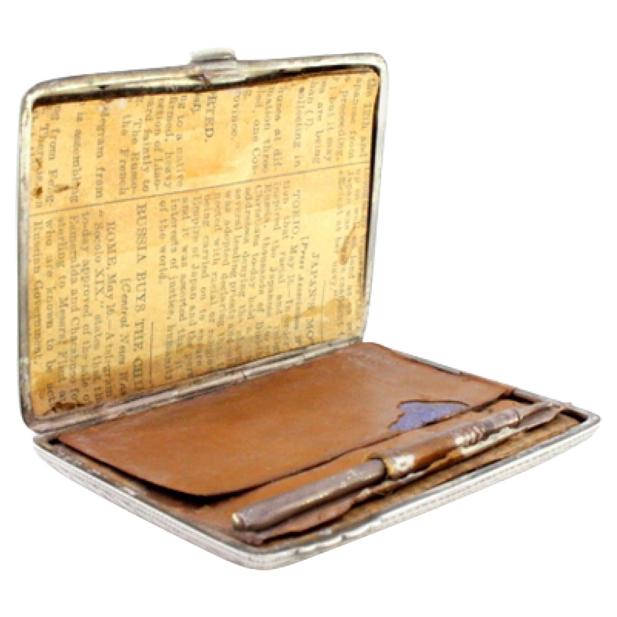 Silver notepad with floral reliefs, pen and leaves For Sale