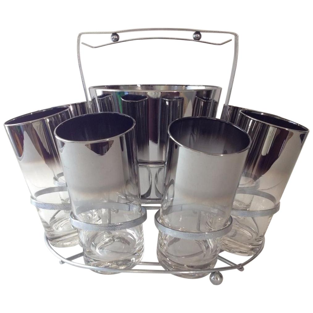 https://a.1stdibscdn.com/silver-ombre-highball-set-with-ice-bucket-and-caddy-for-sale/1121189/f_166184821573055714619/16618482_master.jpg