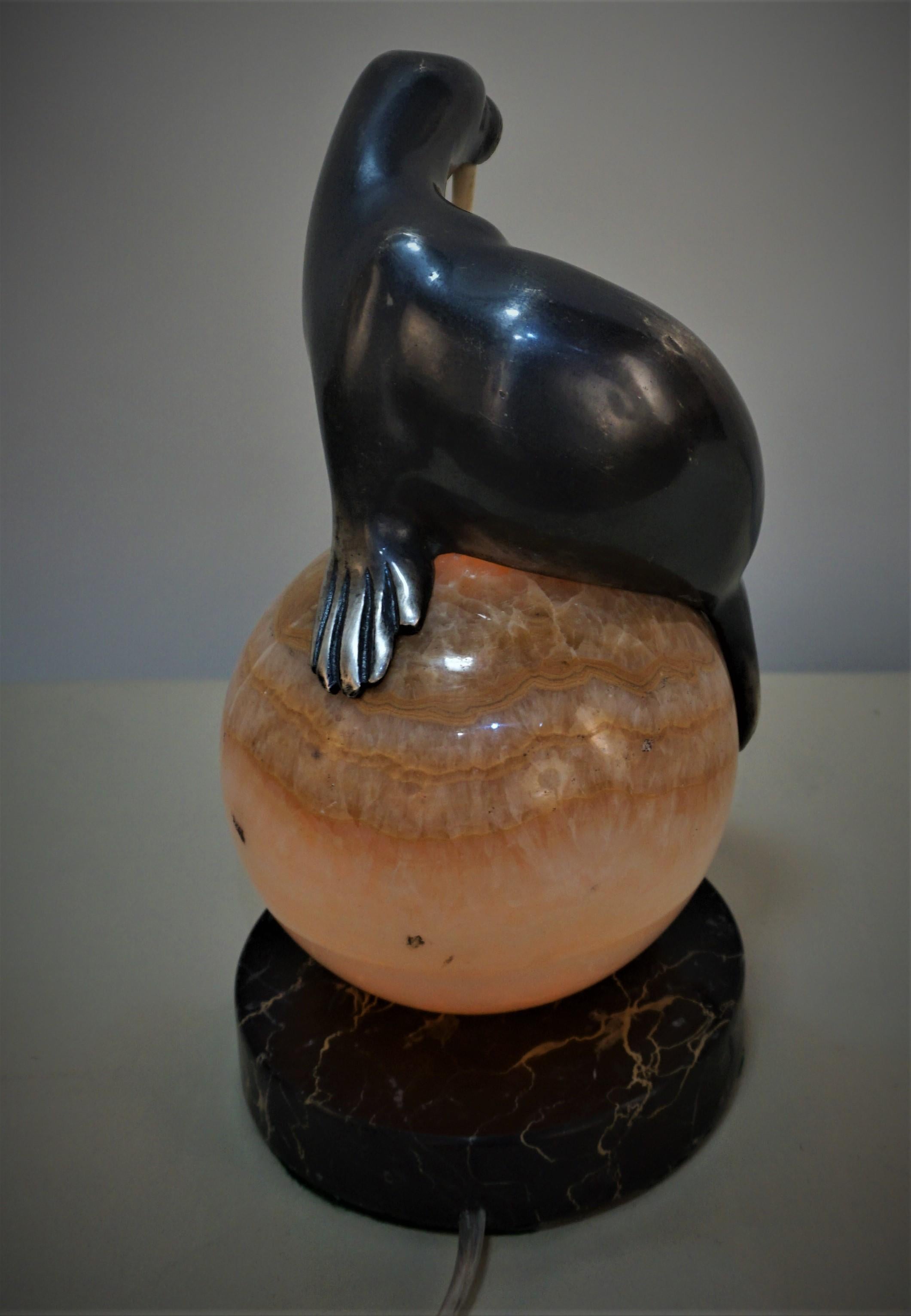 Mid-20th Century Silver on Bronze Seal Laying on an Onyx Ball Lamp