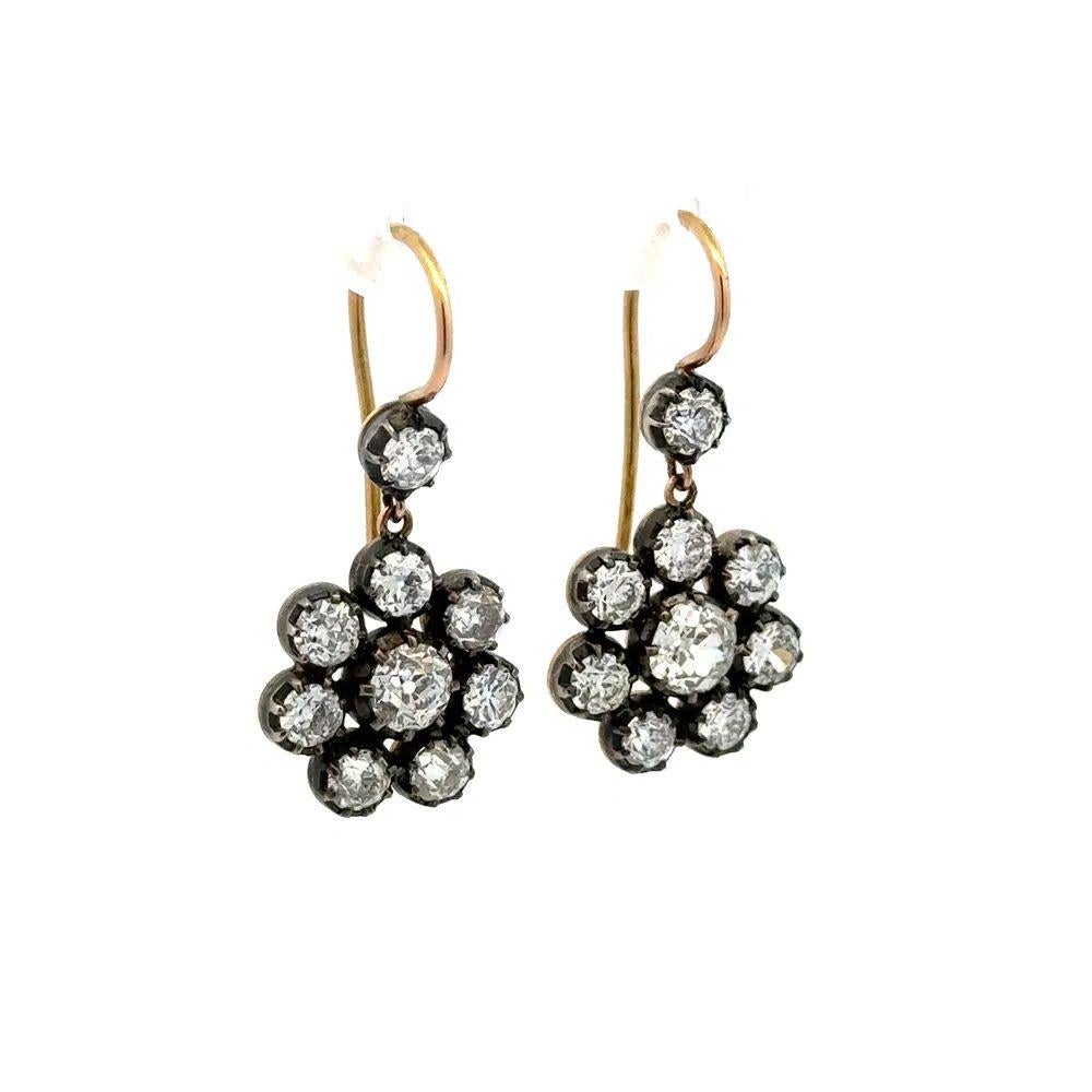 Simply Beautiful! Silver on Gold Old European Cut Diamond Antique Victorian Drop Statement Earrings. . Hand set with 1.10tcw OEC Centers and 2.70tcw OEC Side Diamonds. Beautifully Hand crafted in Silver on 18K Gold. Earrings measure approx. 1.1”