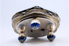 Silver opening bell with mosaic reliefs on three half-ball feet