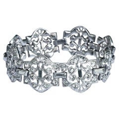 Pulsera Art Déco de eslabones en tono plateado con pedrería, de alrededor de la década de 1930