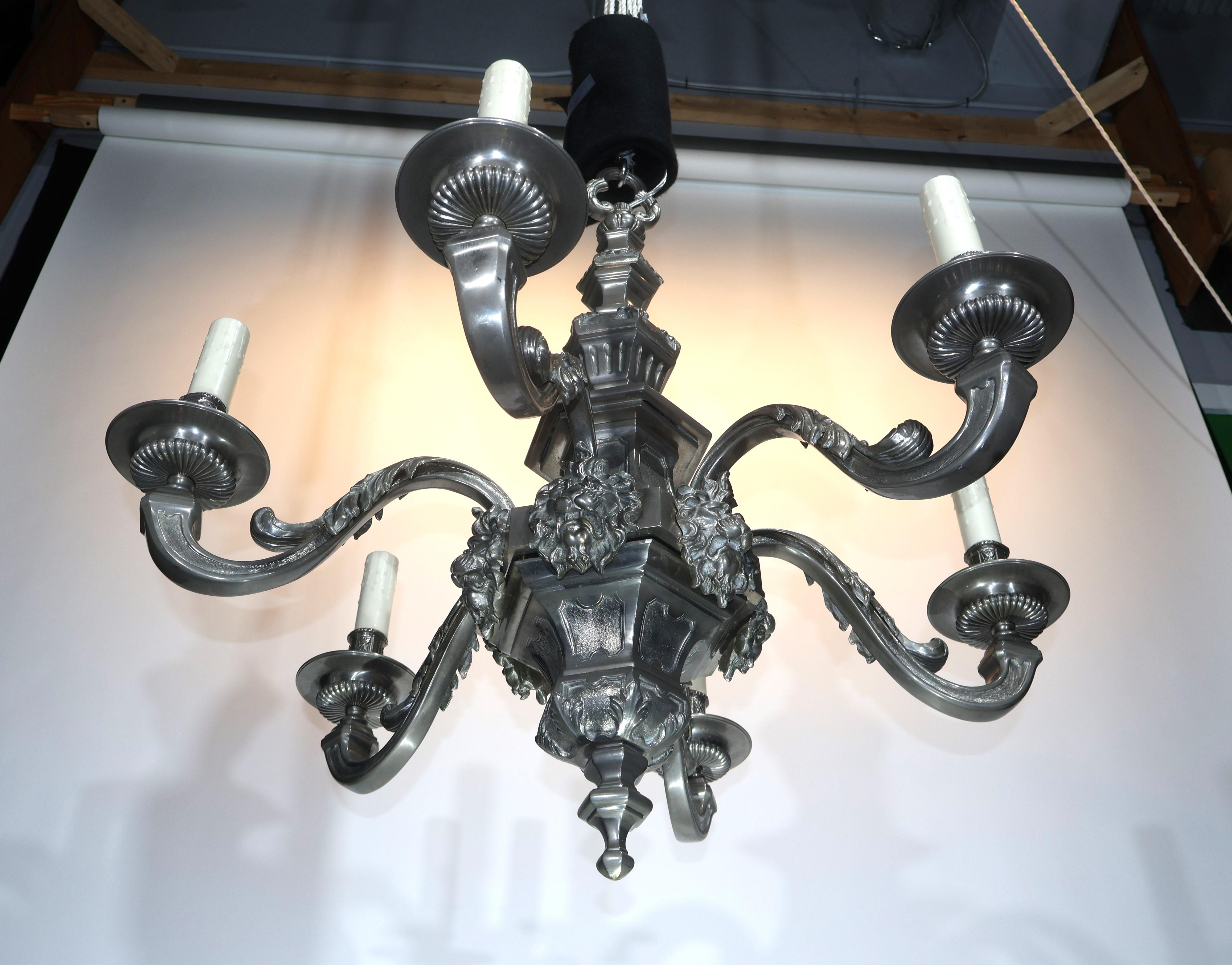 A Very Fine Silver over Bronze Chandelier. Exquisite Detail. Great Workmanship. France, circa 1900.
Dimensions: Height 36