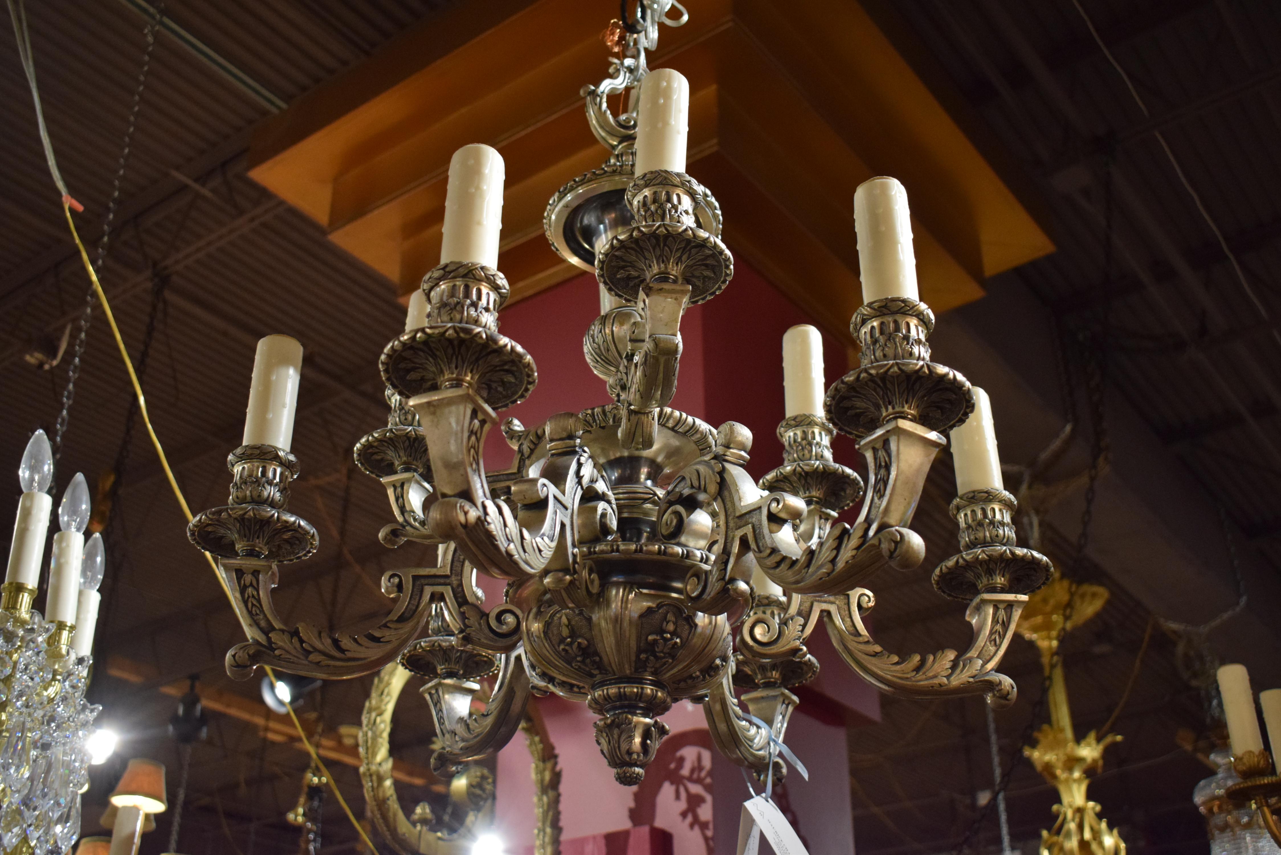 Superb silver over bronze two tiered chandelier. 9 Lights.