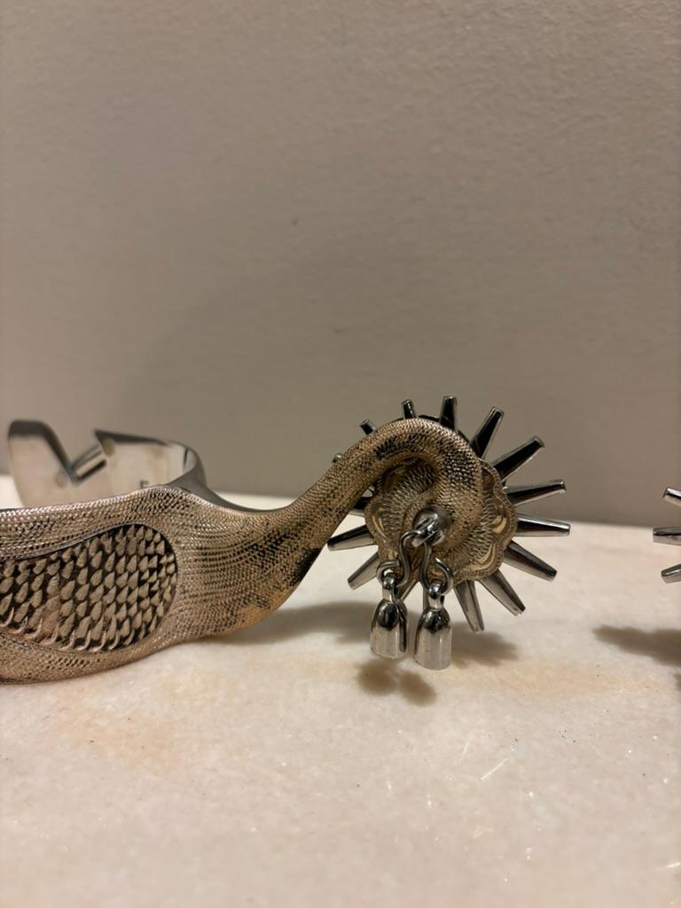 Espuelas de Vaquero de Acero Pulido con Recubrimiento de Plata de Eduardo Garcia  circa 1980's siglo XX en venta