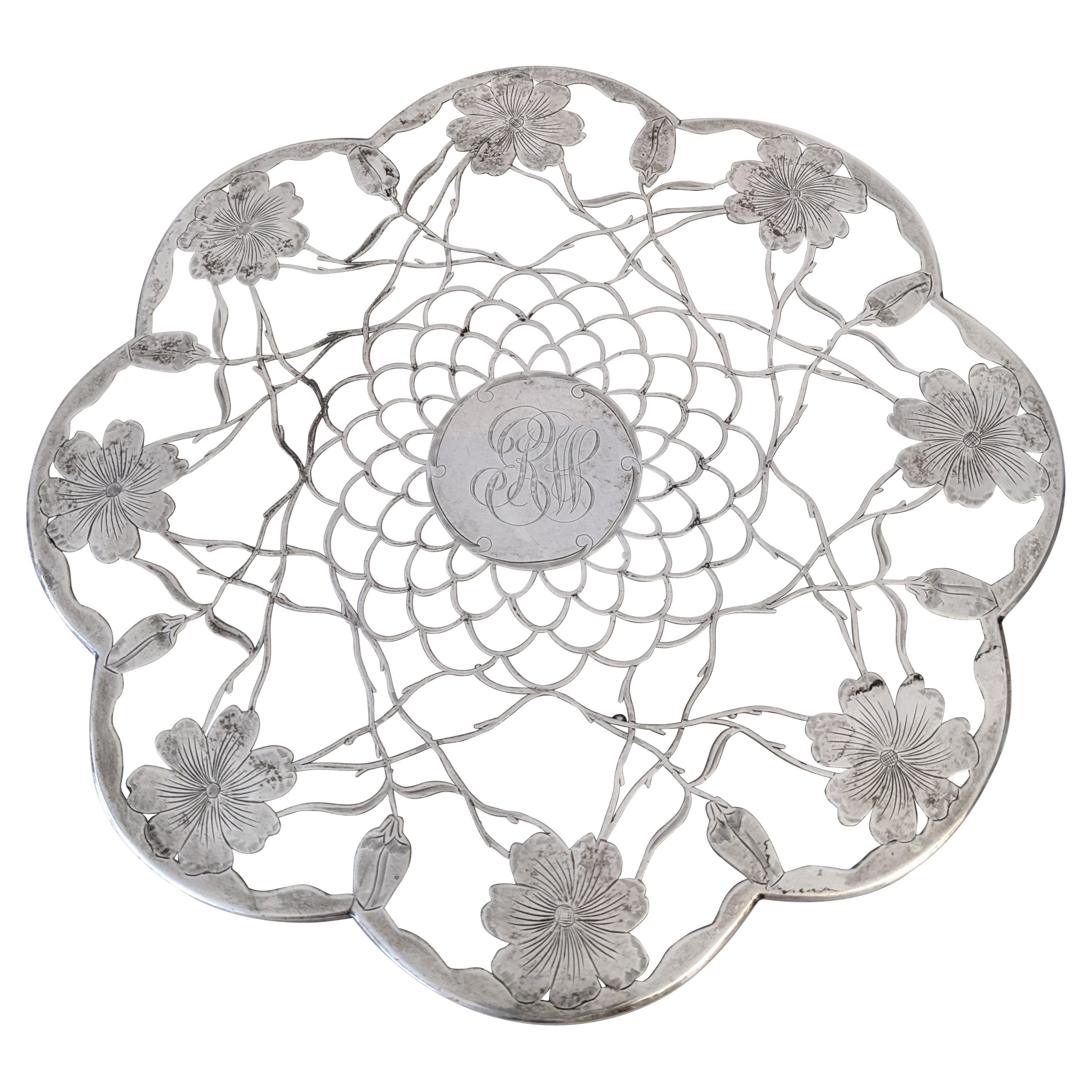 Trivet Art Nouveau incrusté d'argent