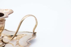 Silbernes Paddel in Form eines ausgeschnittenen Blattes