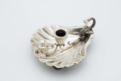 Paleta de plata en forma de concha