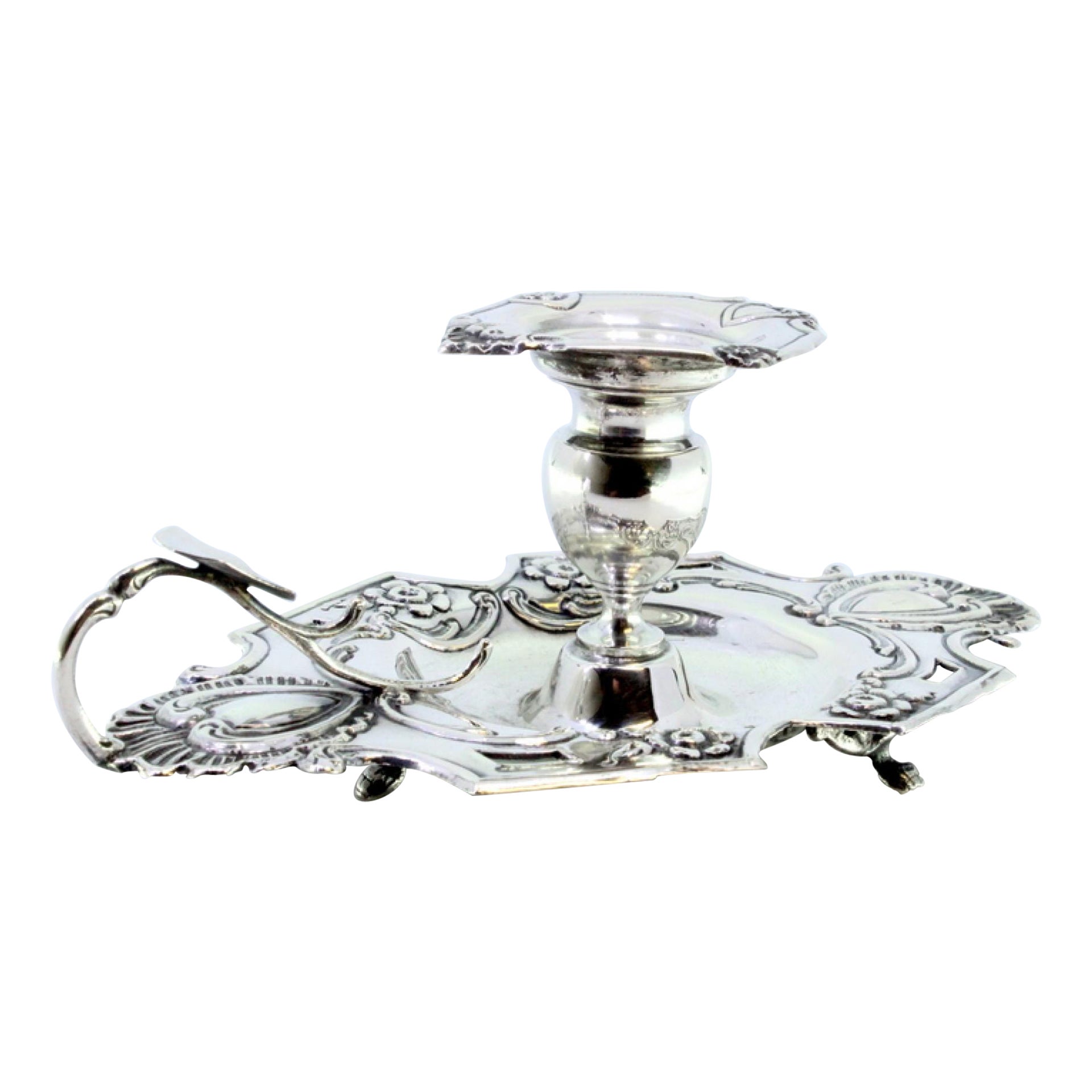 Silver paddle w/ cut-out floral motifs 
applications involving a monogram card