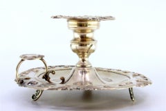 Silver paddle with cut-out floral motifs, ready for electrification