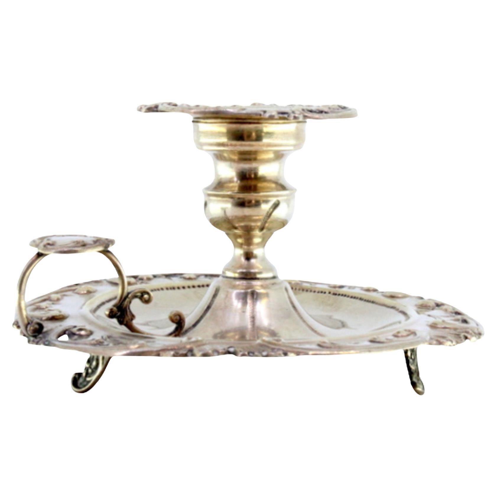 Silver paddle with cut-out floral motifs, ready for electrification