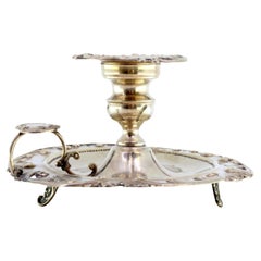 Silver paddle with cut-out floral motifs, ready for electrification