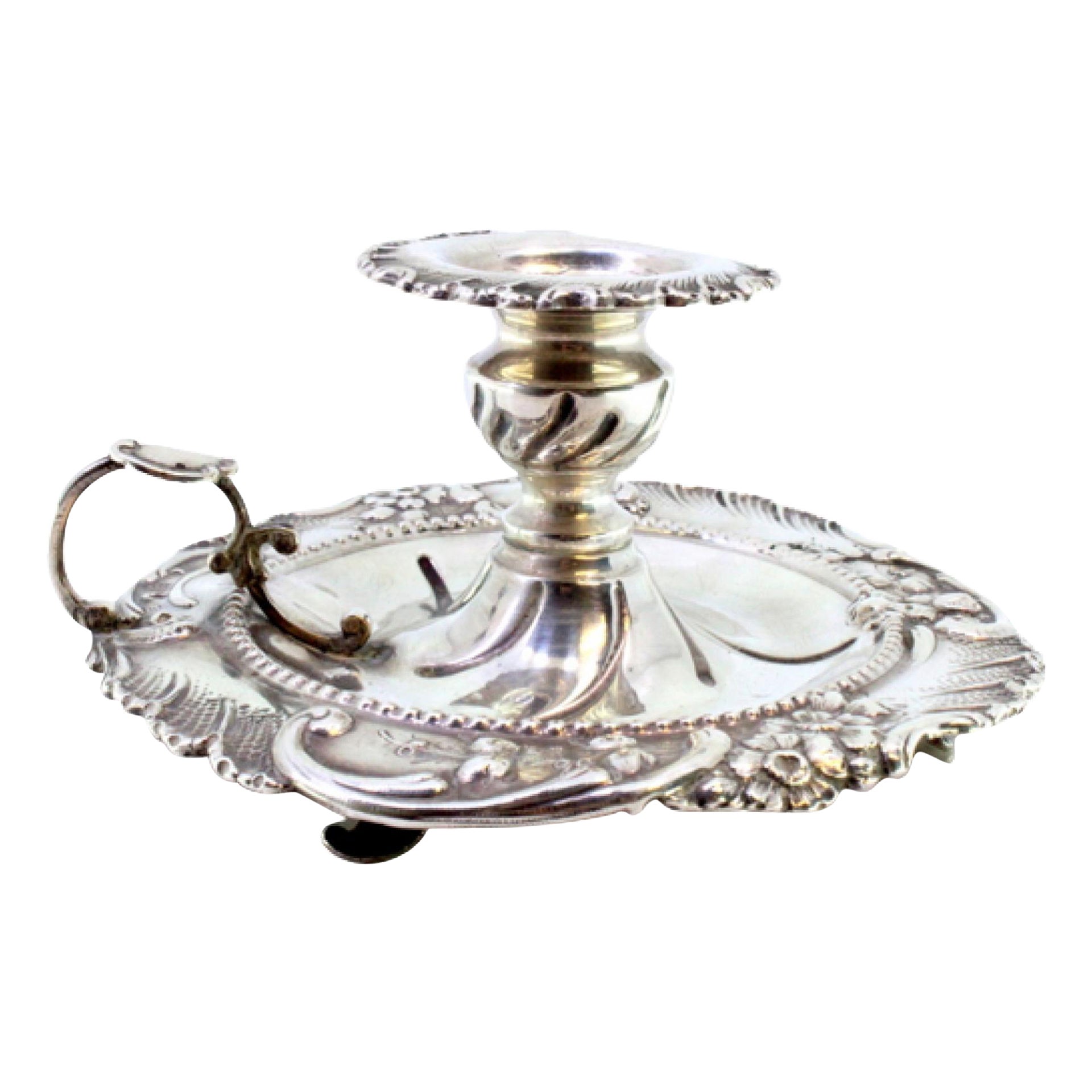 Silver paddle with embossed florals, corded edge, and three feet